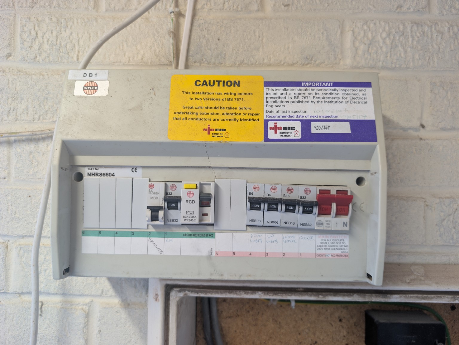 Older Wylex consumer unit before replacement in Perton